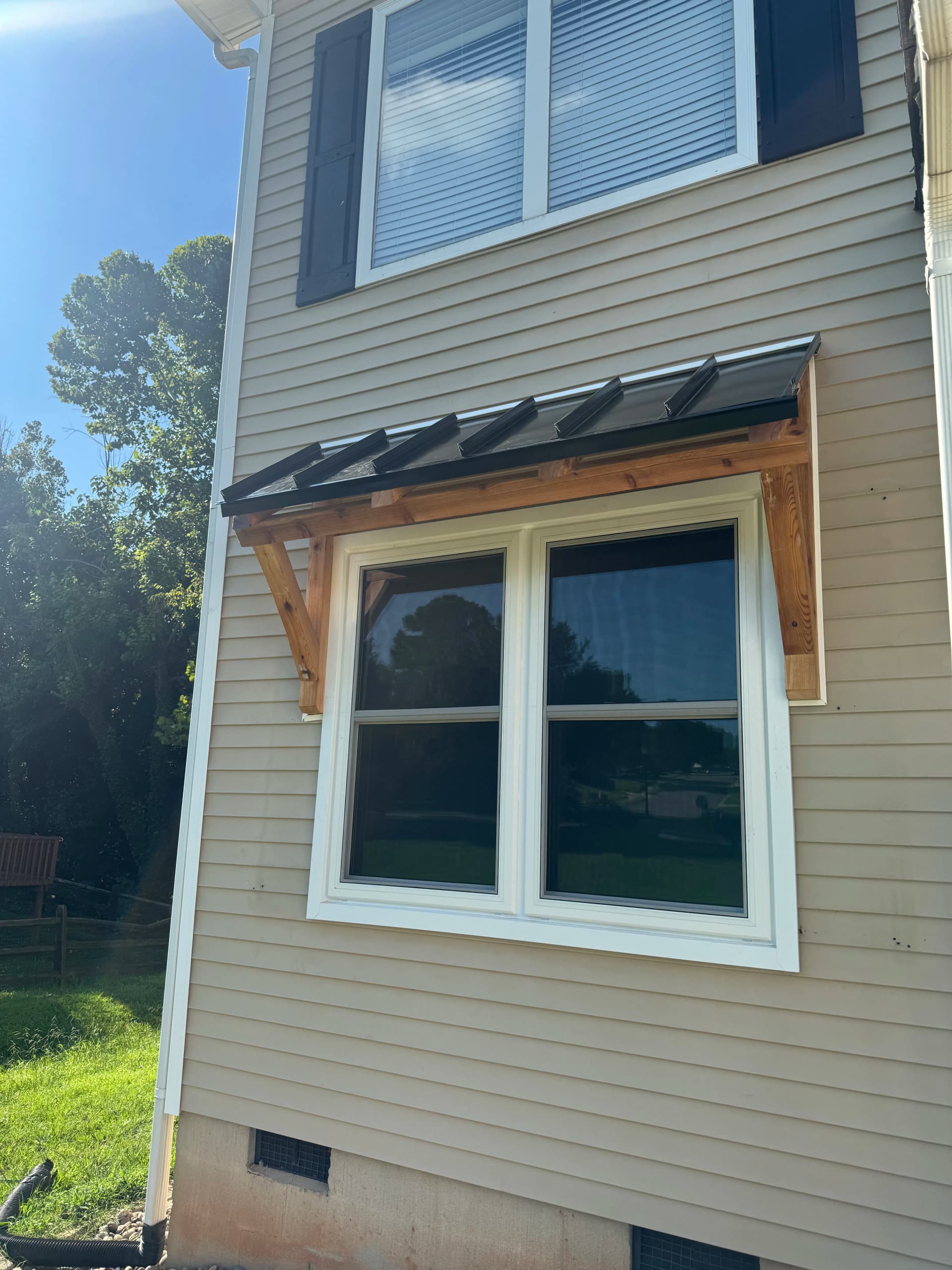 A Wood and Metal Window Awning That Works as Hard as It Looks